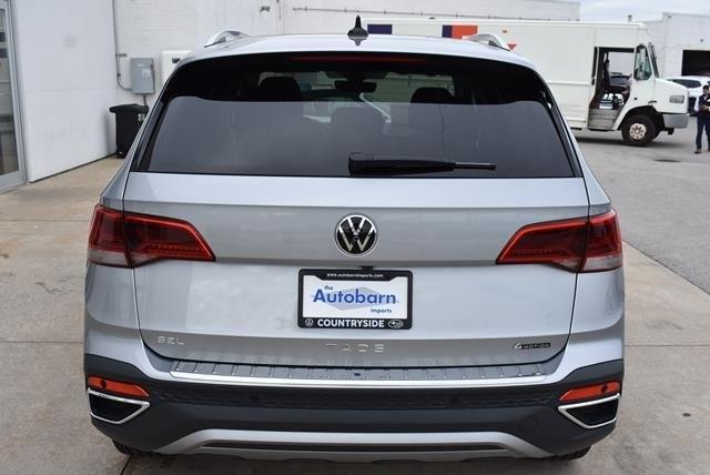 used 2024 Volkswagen Taos car, priced at $31,090