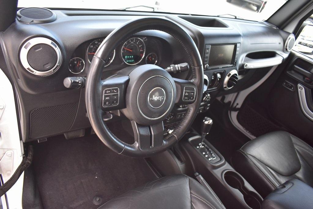used 2016 Jeep Wrangler Unlimited car, priced at $22,991