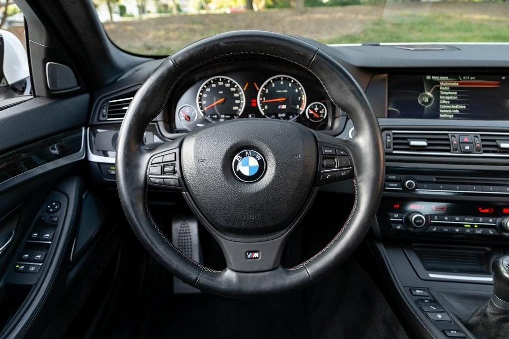 used 2013 BMW M5 car, priced at $60,000