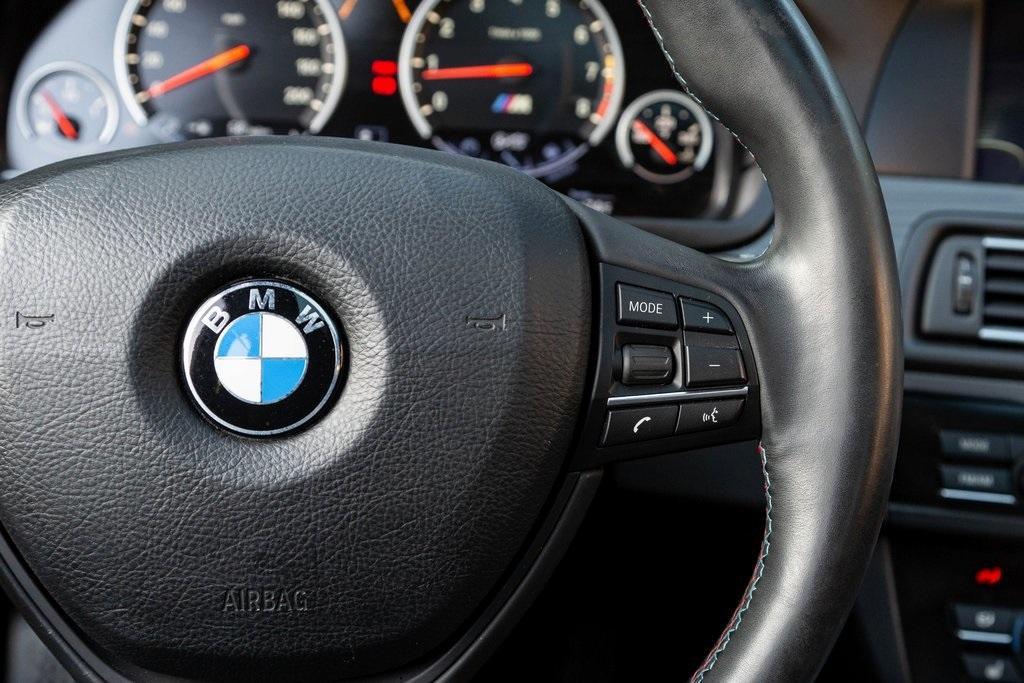 used 2013 BMW M5 car, priced at $60,000