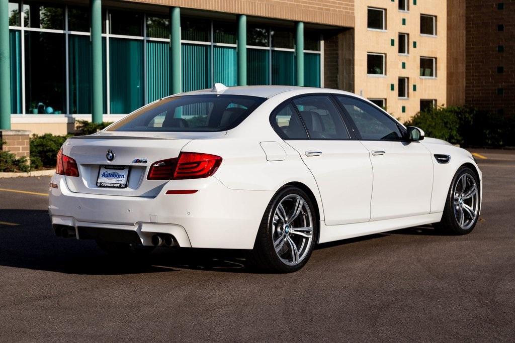 used 2013 BMW M5 car, priced at $60,000