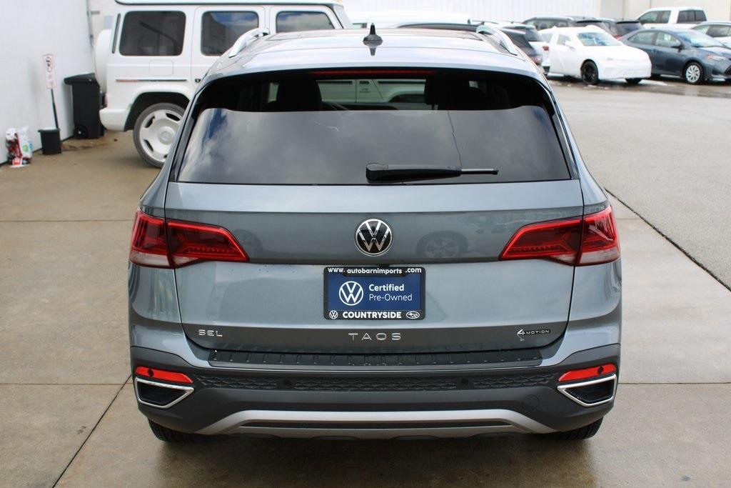 used 2024 Volkswagen Taos car, priced at $28,000