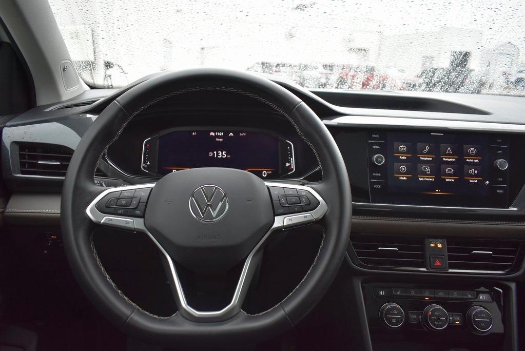 used 2024 Volkswagen Taos car, priced at $29,421