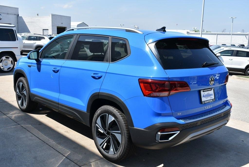 new 2024 Volkswagen Taos car, priced at $28,061