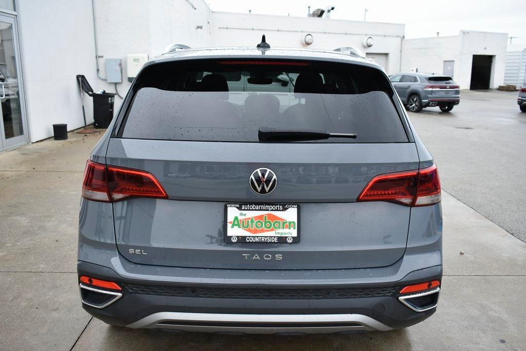 used 2022 Volkswagen Taos car, priced at $23,127