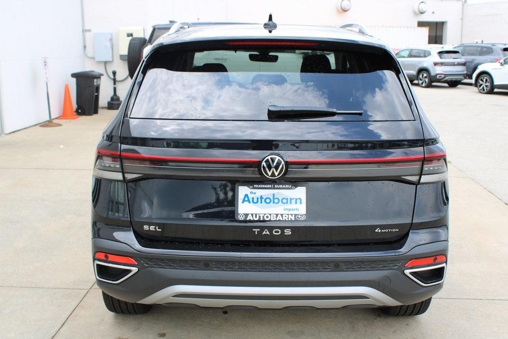 new 2025 Volkswagen Taos car, priced at $36,064