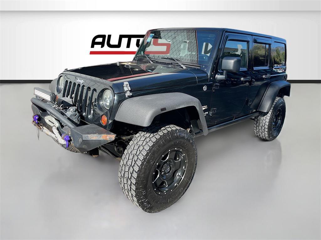 used 2013 Jeep Wrangler Unlimited car, priced at $13,000