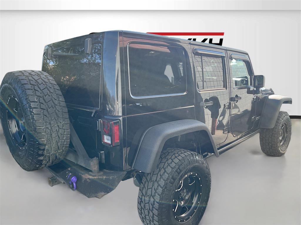 used 2013 Jeep Wrangler Unlimited car, priced at $13,000