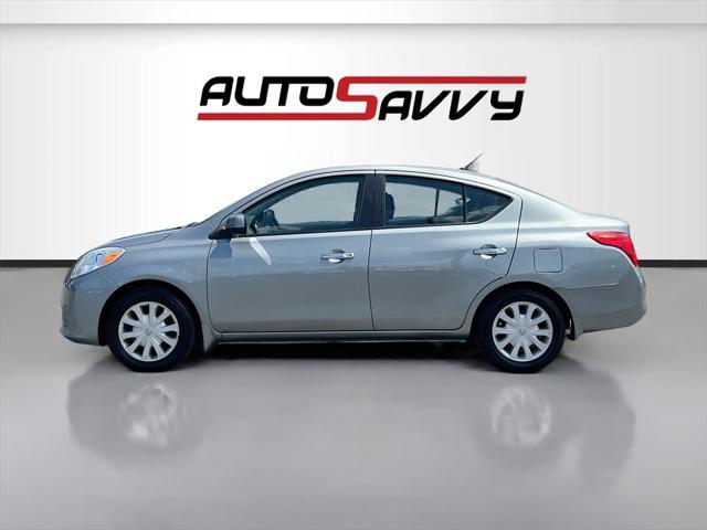 used 2014 Nissan Versa car, priced at $7,500