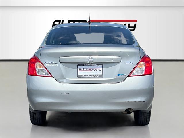 used 2014 Nissan Versa car, priced at $7,500