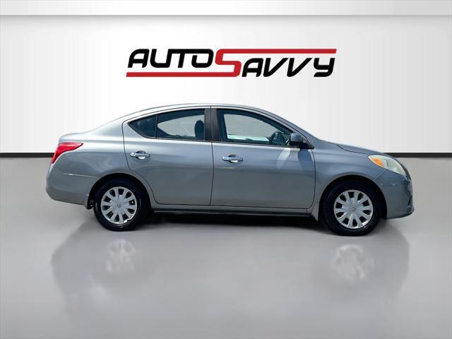 used 2014 Nissan Versa car, priced at $7,500