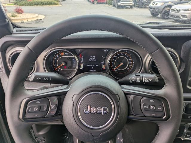 used 2023 Jeep Wrangler car, priced at $29,500