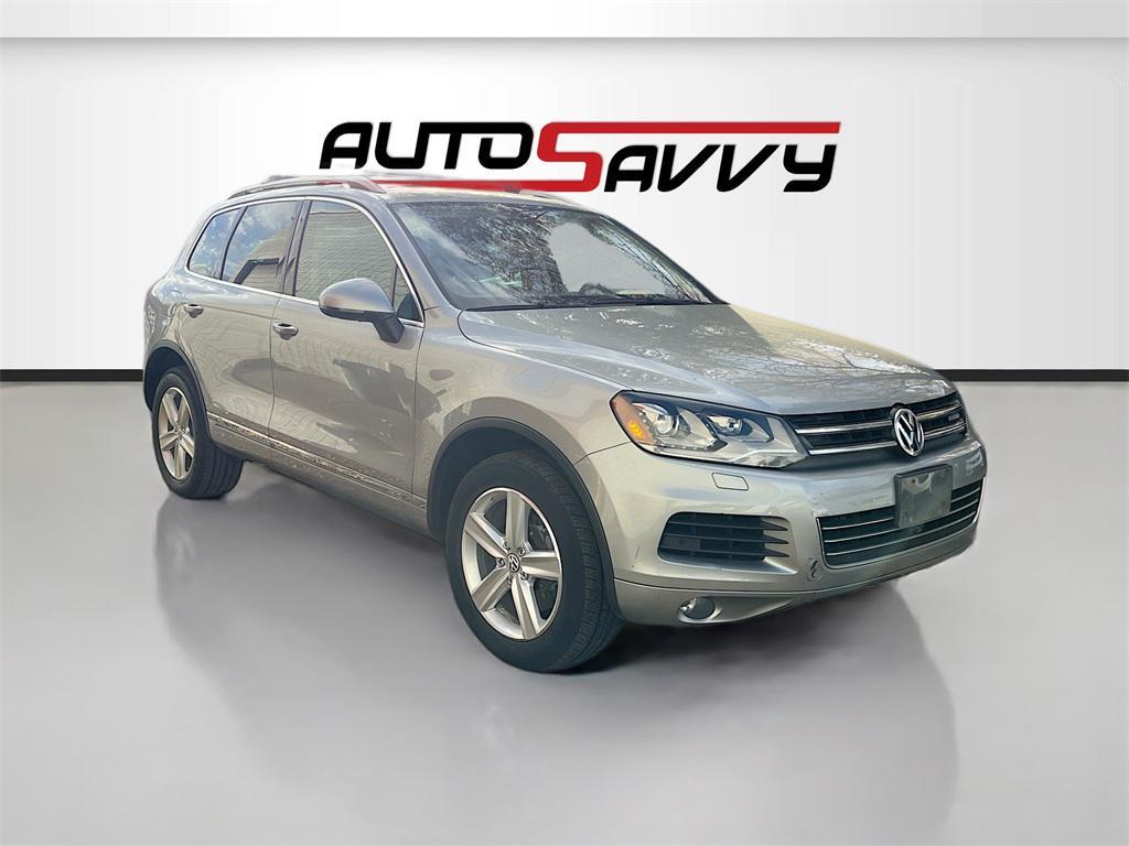 used 2014 Volkswagen Touareg Hybrid car, priced at $9,995