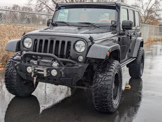 used 2015 Jeep Wrangler Unlimited car, priced at $23,205