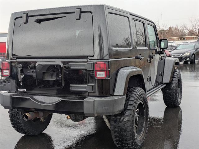 used 2015 Jeep Wrangler Unlimited car, priced at $23,205