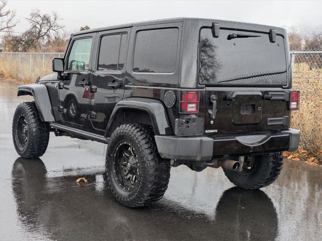 used 2015 Jeep Wrangler Unlimited car, priced at $23,205