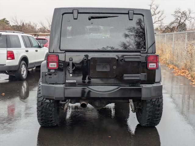 used 2015 Jeep Wrangler Unlimited car, priced at $23,205