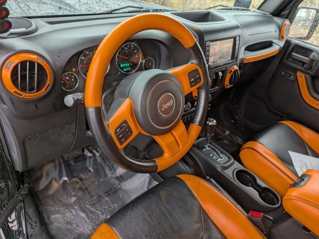 used 2015 Jeep Wrangler Unlimited car, priced at $23,205