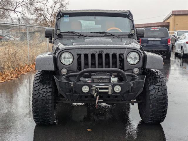 used 2015 Jeep Wrangler Unlimited car, priced at $23,205