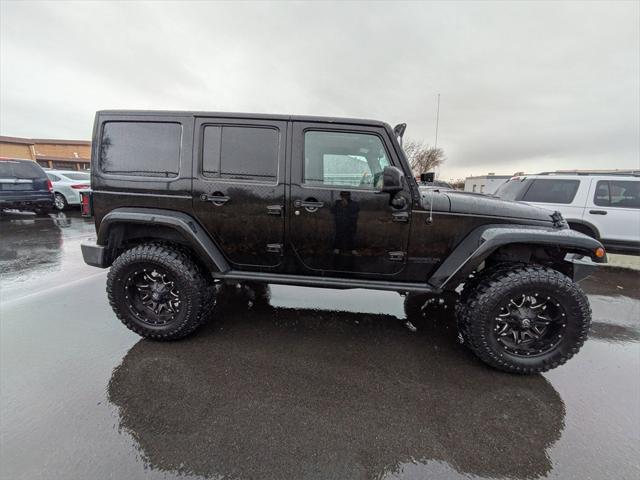 used 2015 Jeep Wrangler Unlimited car, priced at $23,205