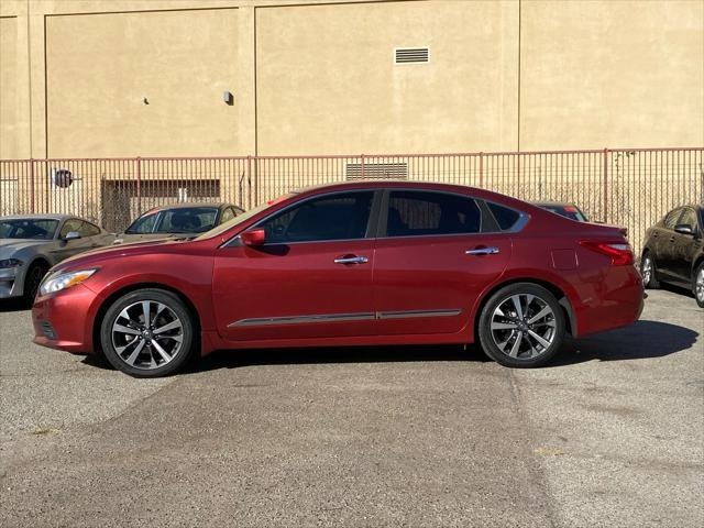 used 2016 Nissan Altima car, priced at $9,999