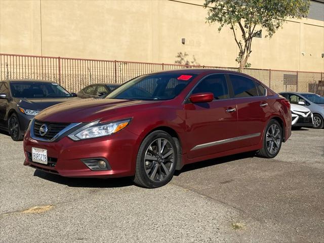 used 2016 Nissan Altima car, priced at $9,999