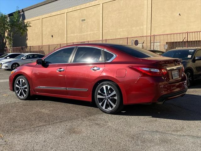 used 2016 Nissan Altima car, priced at $9,999