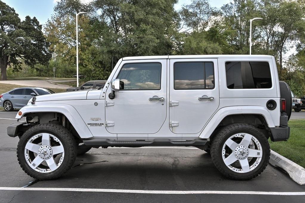 used 2011 Jeep Wrangler Unlimited car, priced at $11,790