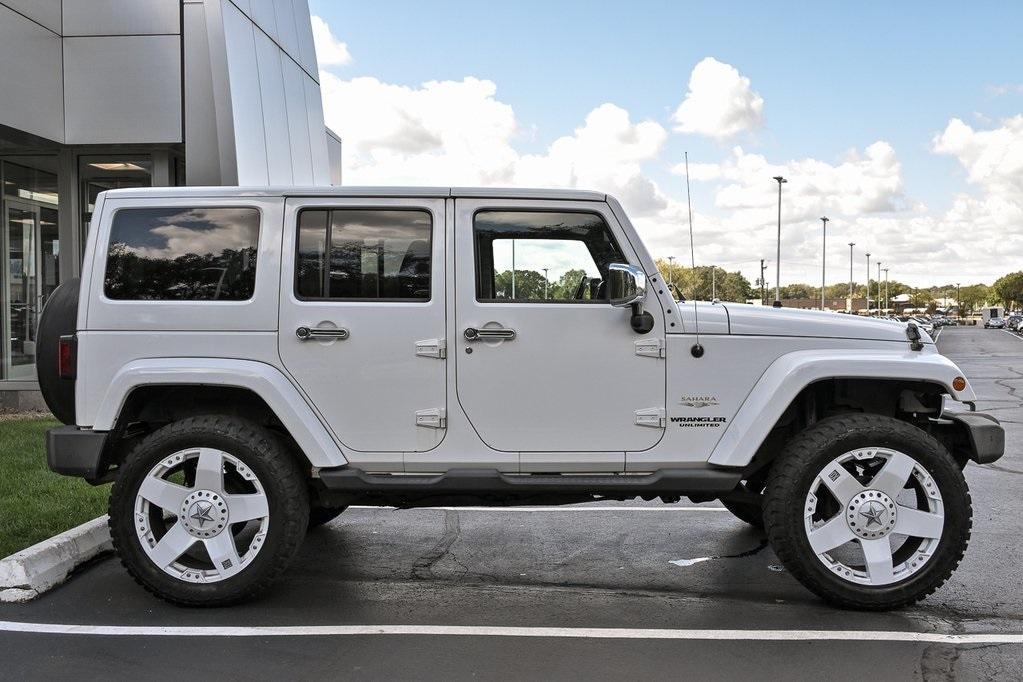 used 2011 Jeep Wrangler Unlimited car, priced at $11,790