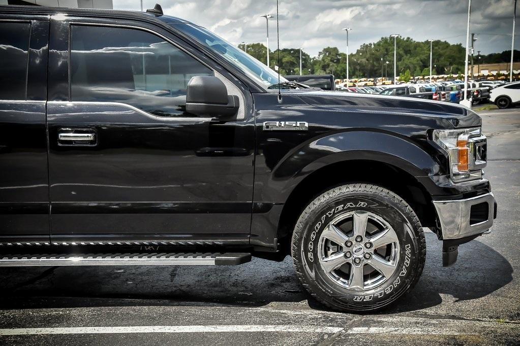 used 2019 Ford F-150 car, priced at $23,390