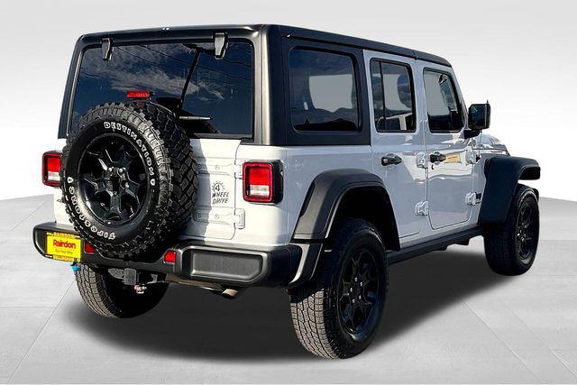 used 2023 Jeep Wrangler 4xe car, priced at $27,897