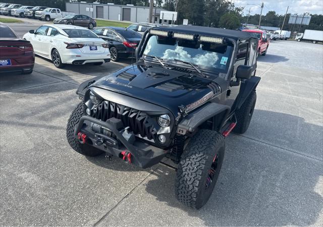 used 2013 Jeep Wrangler car, priced at $16,998