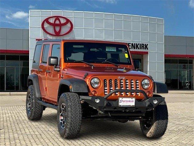 used 2011 Jeep Wrangler Unlimited car, priced at $14,345