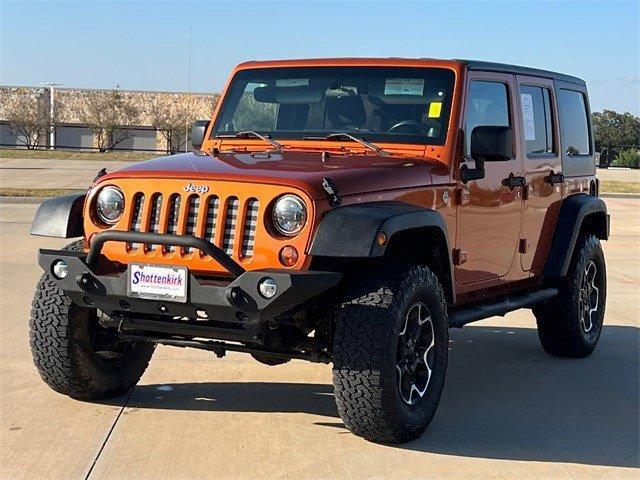 used 2011 Jeep Wrangler Unlimited car, priced at $14,345