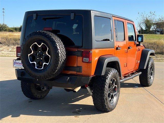 used 2011 Jeep Wrangler Unlimited car, priced at $14,345