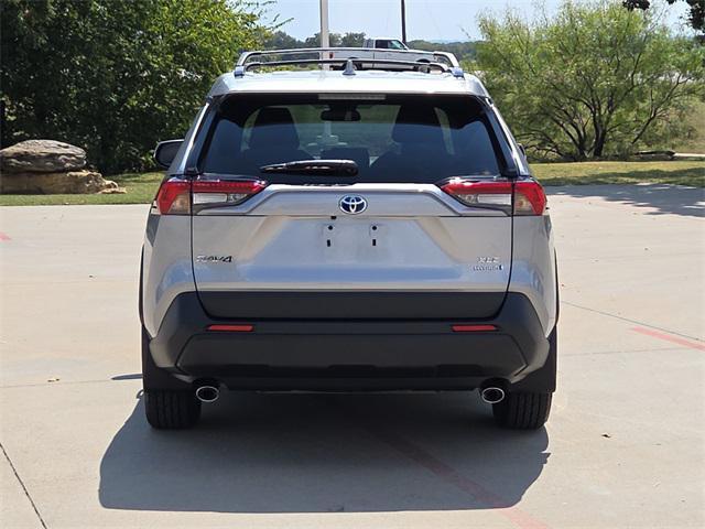 used 2024 Toyota RAV4 Hybrid car, priced at $33,191
