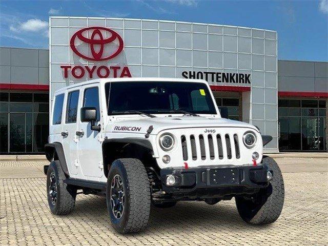 used 2016 Jeep Wrangler Unlimited car, priced at $23,579