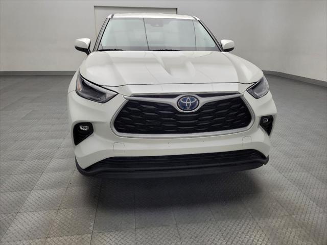 used 2021 Toyota Highlander Hybrid car, priced at $29,195