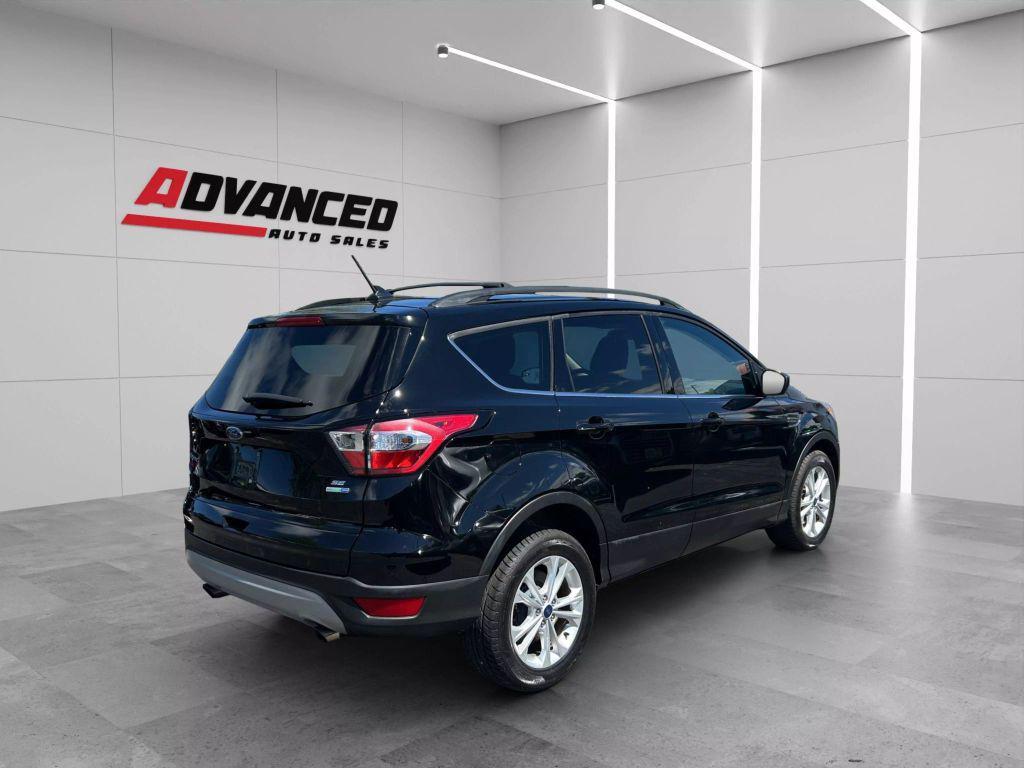 used 2018 Ford Escape car, priced at $12,799