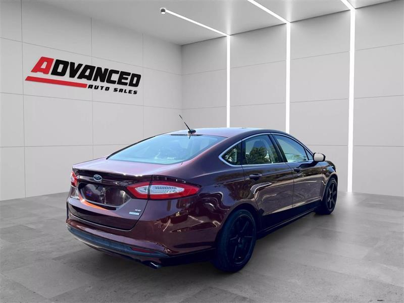 used 2015 Ford Fusion car, priced at $10,299