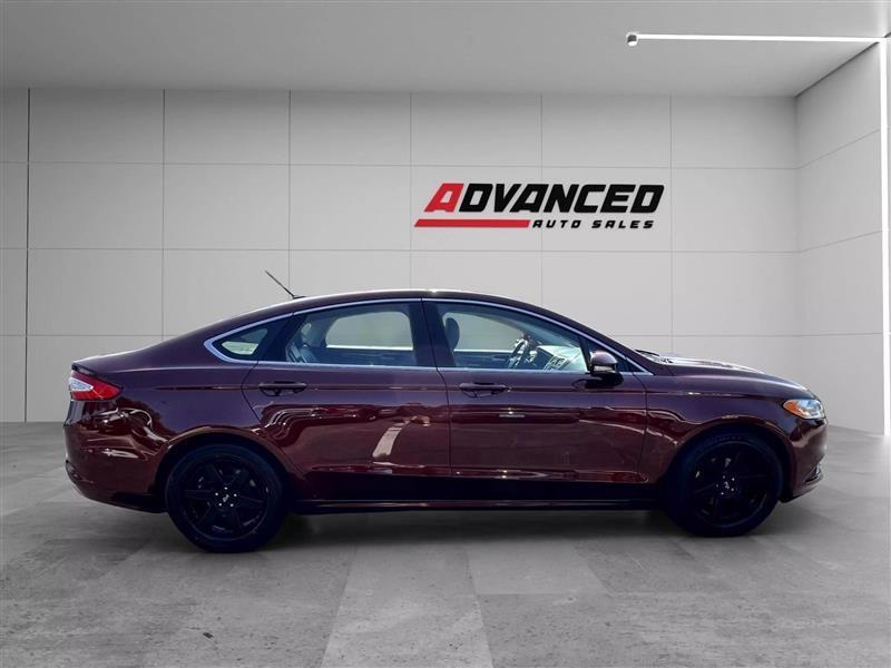 used 2015 Ford Fusion car, priced at $10,299