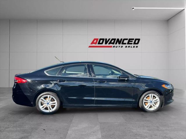 used 2018 Ford Fusion car, priced at $12,799