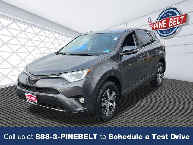 used 2018 Toyota RAV4 car, priced at $16,000