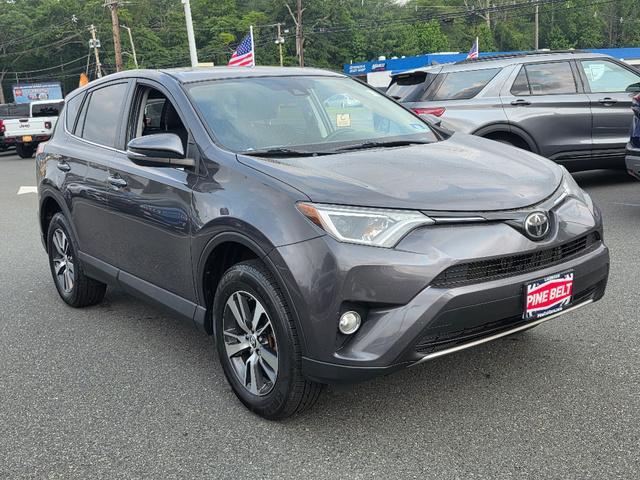 used 2018 Toyota RAV4 car, priced at $16,000