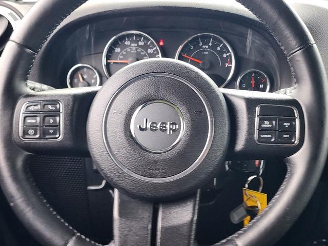 used 2015 Jeep Wrangler Unlimited car, priced at $21,892