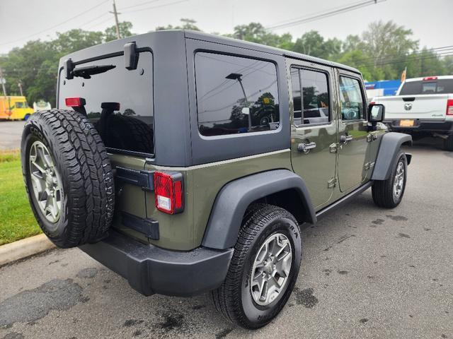 used 2015 Jeep Wrangler Unlimited car, priced at $21,892