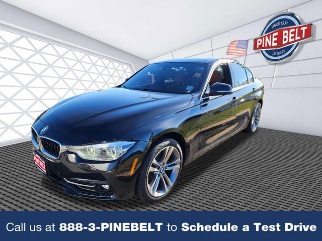 used 2018 BMW 330 car, priced at $15,125