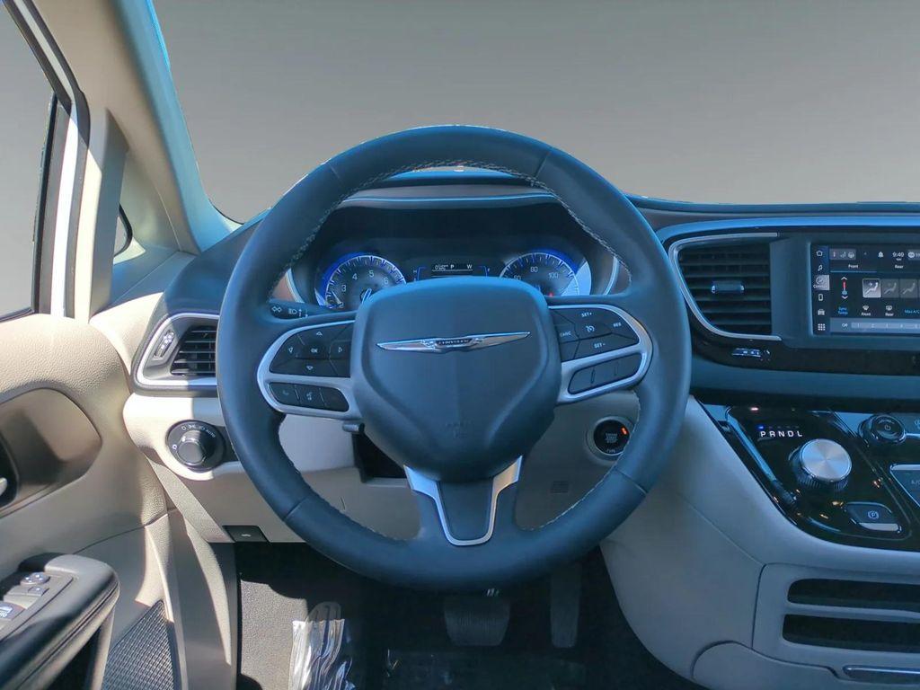 used 2023 Chrysler Voyager car, priced at $22,900