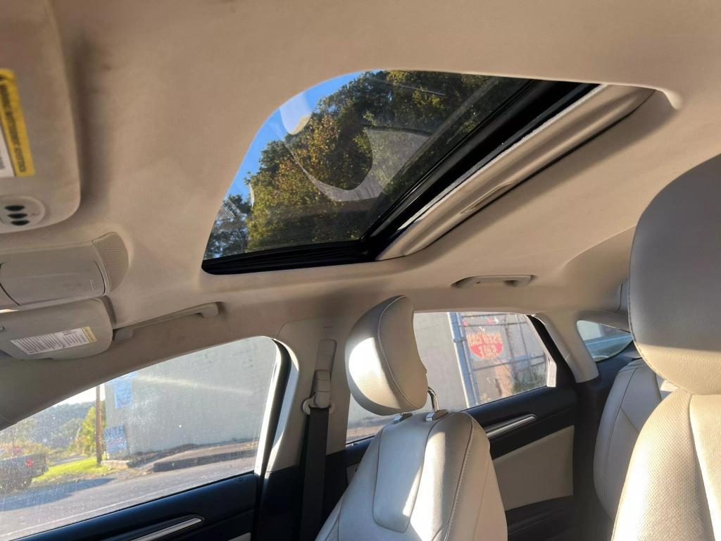 used 2015 Ford Fusion car, priced at $11,495