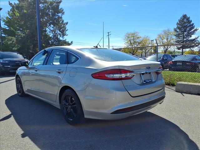 used 2018 Ford Fusion car, priced at $13,980